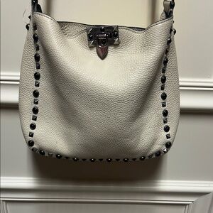 Valentino Studded Cream Leather Shoulder Bag. Adjustable strap. 10” x 10”.